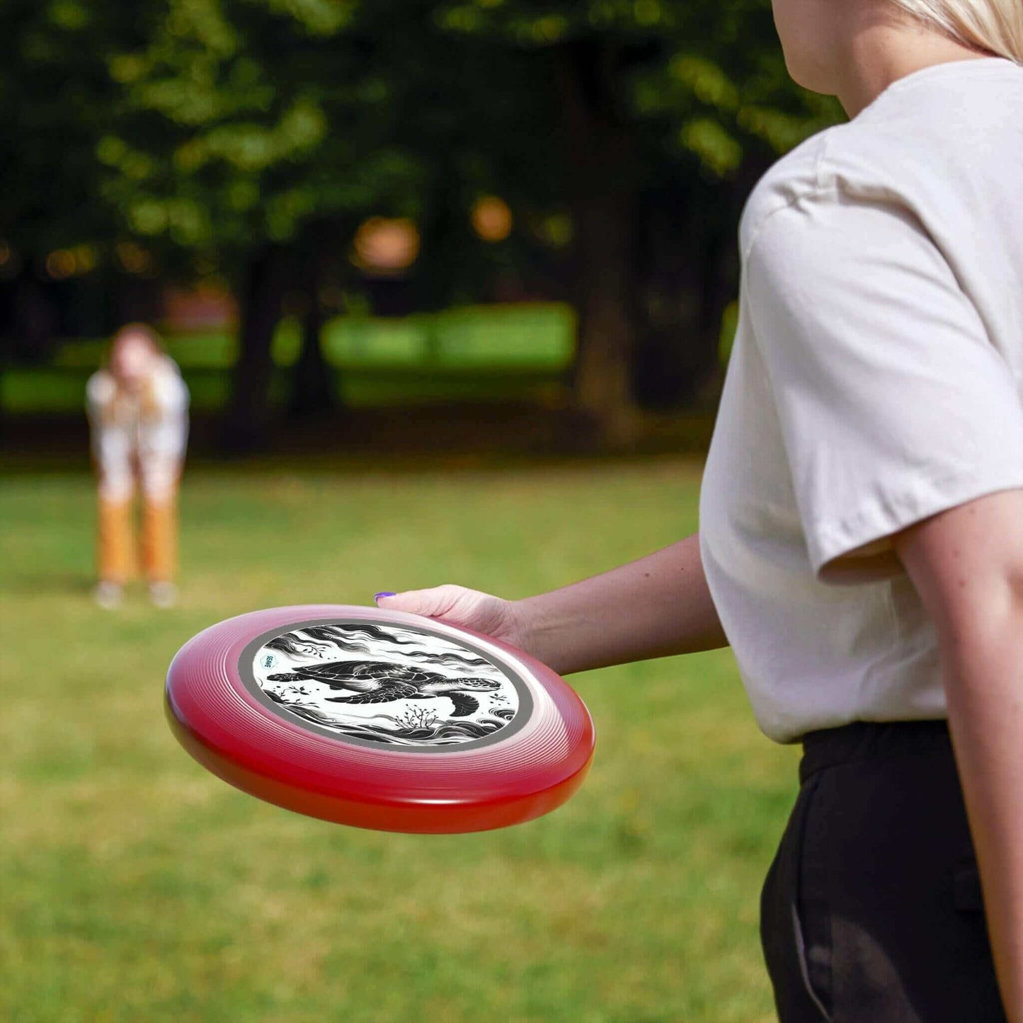 Sea Turtle Black/White Wham-O Frisbee Stop in your tracks! This isn't your average frisbee. The eye-catching Colorful Sea Turtle Wham-O Frisbee is ready to soar. Iconic Wham-O brand ensures top performance and durability Vibrant sea turtle design availabl