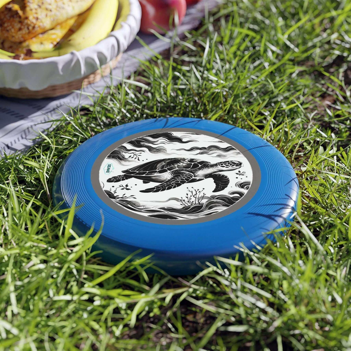 Sea Turtle Black/White Wham-O Frisbee Stop in your tracks! This isn't your average frisbee. The eye-catching Colorful Sea Turtle Wham-O Frisbee is ready to soar. Iconic Wham-O brand ensures top performance and durability Vibrant sea turtle design availabl