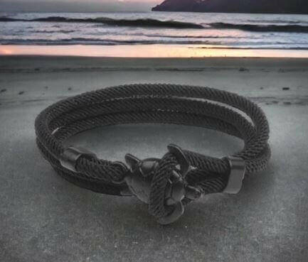 Sea Turtle Rope Bracelet with Silver/Black Charm Treat your wrist to a trendy nautical charm with the sea Turtle Rope Bracelet. This handcrafted accessory brings coastal vibes to any outfit. Key features/benefits: Adjustable rope bracelet with a polished