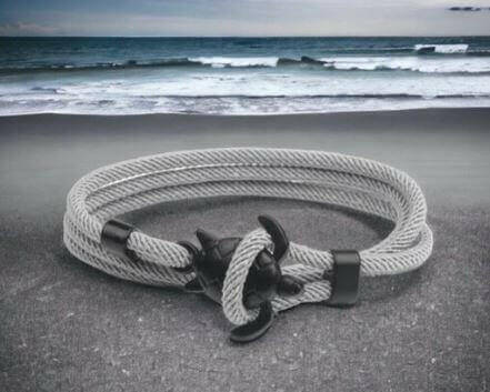 Sea Turtle Rope Bracelet with Silver/Black Charm Treat your wrist to a trendy nautical charm with the sea Turtle Rope Bracelet. This handcrafted accessory brings coastal vibes to any outfit. Key features/benefits: Adjustable rope bracelet with a polished