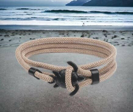 Sea Turtle Rope Bracelet with Silver/Black Charm Treat your wrist to a trendy nautical charm with the sea Turtle Rope Bracelet. This handcrafted accessory brings coastal vibes to any outfit. Key features/benefits: Adjustable rope bracelet with a polished