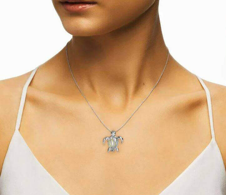 Sea Turtle Glow in the Dark Luminous Necklace Grab this glowing sea turtle necklace and add an oceanic glow to your style - this handmade luminous necklace is the perfect way to showcase your love for sea turtles. Beautiful luminous pendant glows in the d