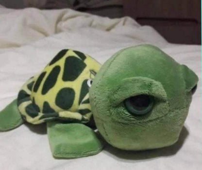 Sea Turtle Plushie Soft Toy in Green Bring the magic of the sea home with our lovable Sea Turtle Plushie! Handmade with care using eco-friendly, sustainable materials Vibrant colors and intricate details capture the beauty of real sea turtles Ultra-soft a