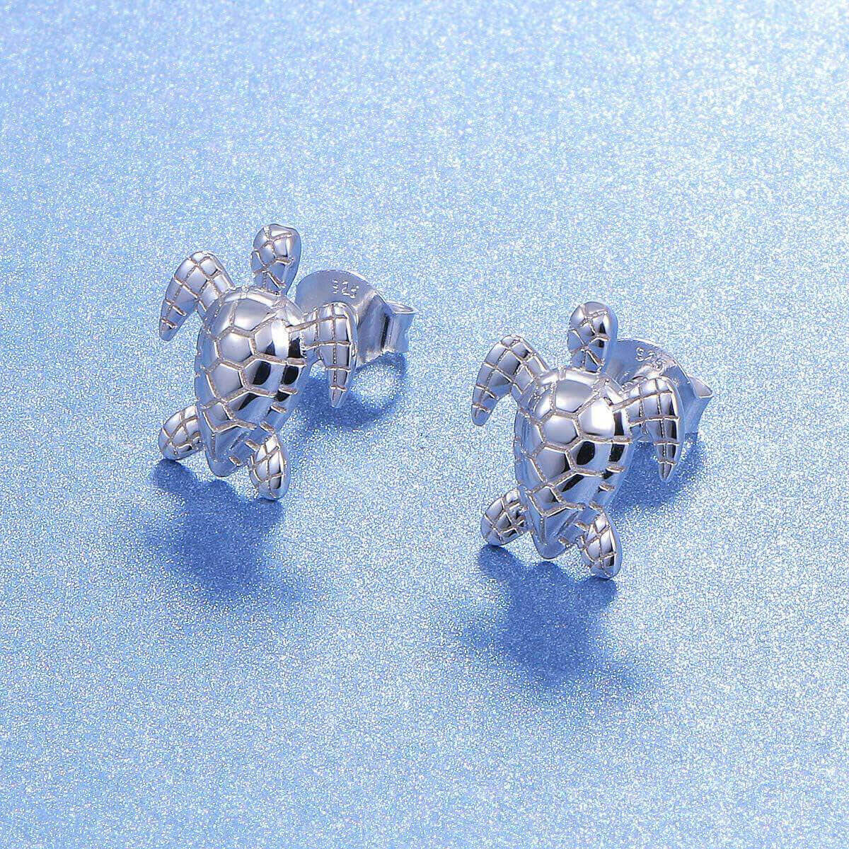 Sterling Silver Classic Sea Turtle Earrings Make a splash with these charming Sterling Silver Classic Sea Turtle Earrings. Crafted from 925 sterling silver with a polished platinum finish, these cute turtle earrings feature exquisite detailing that brings