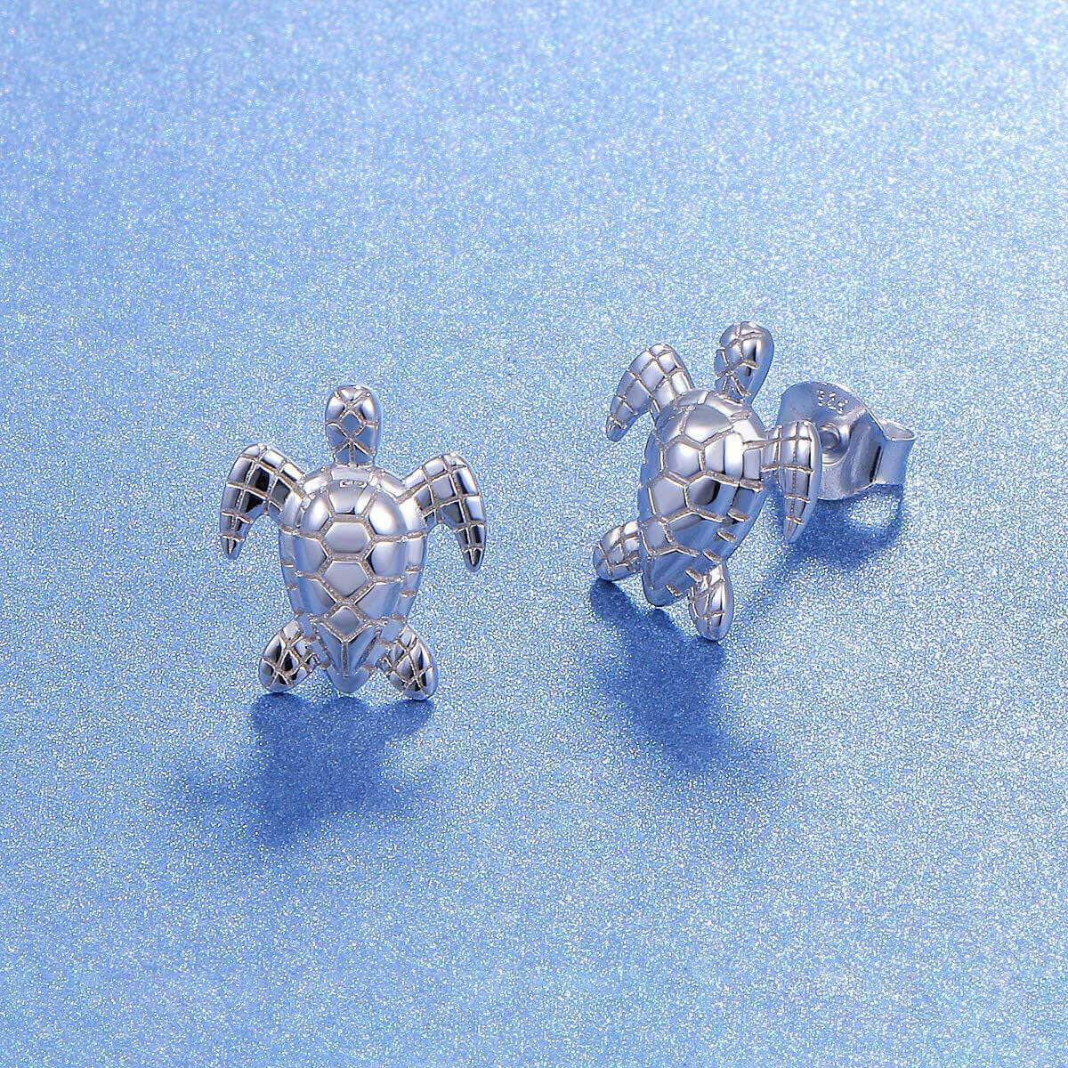 Sterling Silver Classic Sea Turtle Earrings Make a splash with these charming Sterling Silver Classic Sea Turtle Earrings. Crafted from 925 sterling silver with a polished platinum finish, these cute turtle earrings feature exquisite detailing that brings