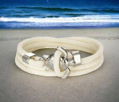 Sea Turtle Rope Bracelet with Silver/Black Charm Treat your wrist to a trendy nautical charm with the sea Turtle Rope Bracelet. This handcrafted accessory brings coastal vibes to any outfit. Key features/benefits: Adjustable rope bracelet with a polished