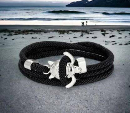 Sea Turtle Rope Bracelet with Silver/Black Charm Treat your wrist to a trendy nautical charm with the sea Turtle Rope Bracelet. This handcrafted accessory brings coastal vibes to any outfit. Key features/benefits: Adjustable rope bracelet with a polished