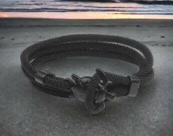 Sea Turtle Rope Bracelet with Silver/Black Charm Treat your wrist to a trendy nautical charm with the sea Turtle Rope Bracelet. This handcrafted accessory brings coastal vibes to any outfit. Key features/benefits: Adjustable rope bracelet with a polished