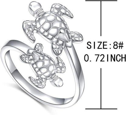 Double Sea Turtle Sterling Silver Ring Dive into luxury with the Sterling Silver Double Sea Turtle Ring. Handcrafted from 925 hypoallergenic sterling silver for timeless beauty Platinum plating ensures lasting shine without irritation Two sea turtles desi