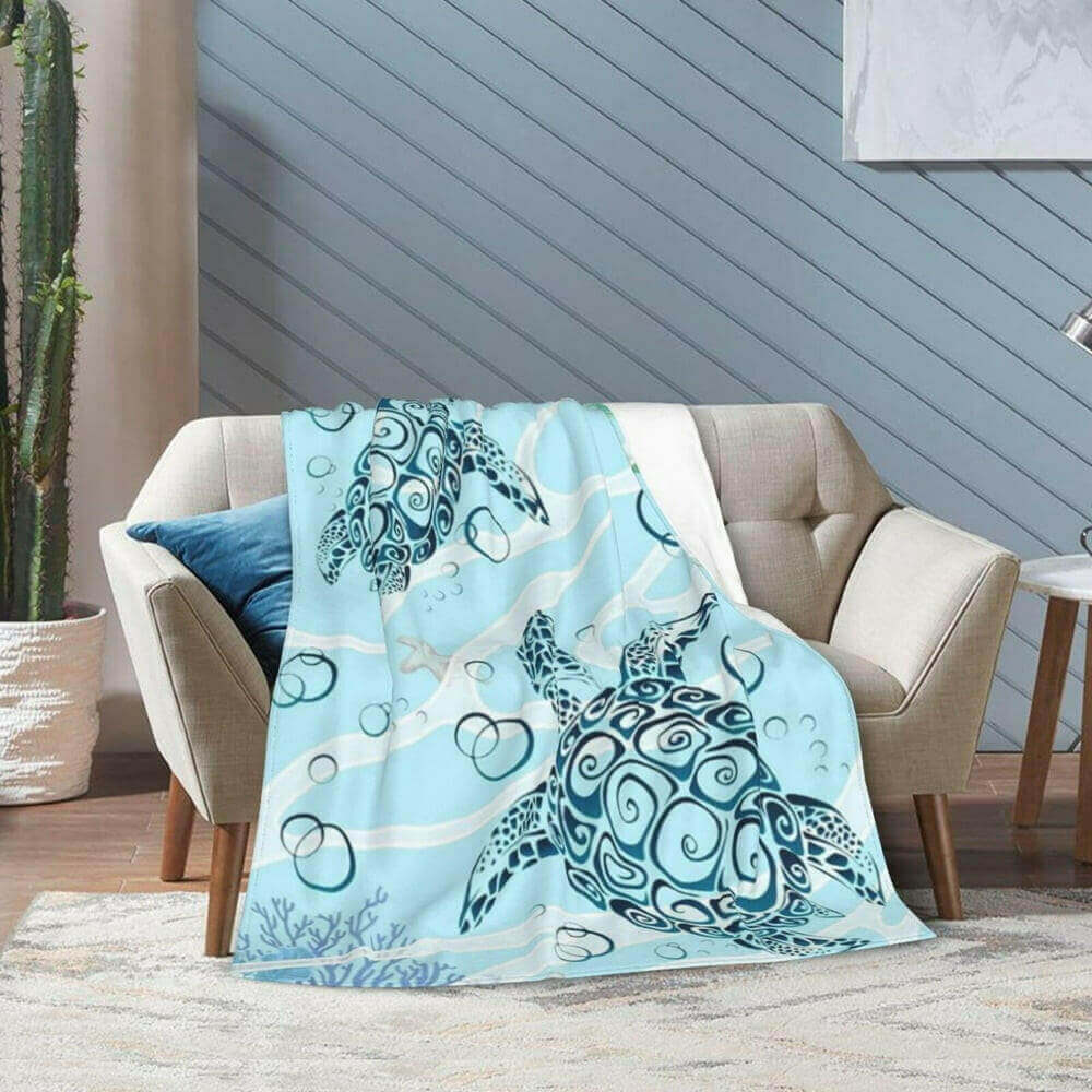 Oceananic Sea Turtle Super Soft Fleece Blanket Welcome to the softest blanket you'll ever cuddle with. Our Oceananic Sea Turtle Super Soft Fleece Blanket will keep you warm, cozy, and comforted all year round. Unique sea turtle design that looks as realis