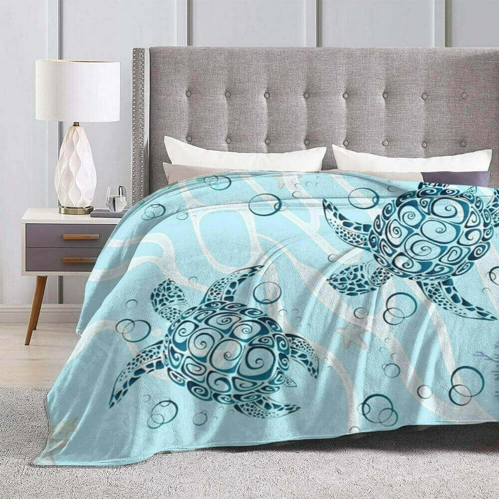 Oceananic Sea Turtle Super Soft Fleece Blanket Welcome to the softest blanket you'll ever cuddle with. Our Oceananic Sea Turtle Super Soft Fleece Blanket will keep you warm, cozy, and comforted all year round. Unique sea turtle design that looks as realis