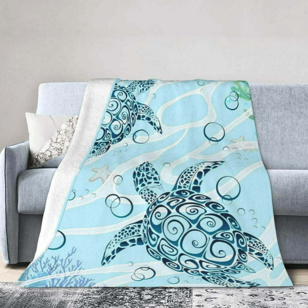 Oceananic Sea Turtle Super Soft Fleece Blanket Welcome to the softest blanket you'll ever cuddle with. Our Oceananic Sea Turtle Super Soft Fleece Blanket will keep you warm, cozy, and comforted all year round. Unique sea turtle design that looks as realis